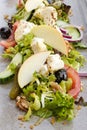 Fresh salad with grilled goat cheese wit fruit and vegetables Royalty Free Stock Photo