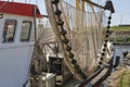 Shrimp boat with nets in the harbour of Zoutkamp The Netherlands Royalty Free Stock Photo