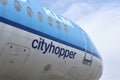 The front of the KLM Cityhopper at the Schiphol Airport