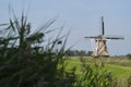 View on a traditional thatched dutch windmill in Hantum Royalty Free Stock Photo