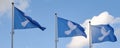 Three blue peace flags with a dove and olive branch in its beak