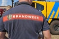Dutch fire department logo on a firefighter\'s shirt with text brandweer Royalty Free Stock Photo