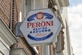 Peroni logo sign on the facade of a restaurant Royalty Free Stock Photo