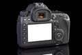 DSLR camera on black glass Royalty Free Stock Photo
