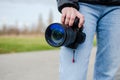 DSLR camera with broken lens filter. Cracked photo-filter Royalty Free Stock Photo