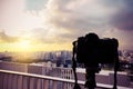 Dslr camera digital shooting on a cityscape sunset Royalty Free Stock Photo