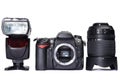 DSLR camera, lens and flash Royalty Free Stock Photo