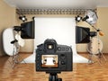 DSLR camera in photo studio with lighting equipment, softbox and Royalty Free Stock Photo
