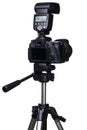 DSLR camera on tripod with external flash Royalty Free Stock Photo
