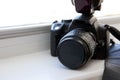 DSLR camera in the window Royalty Free Stock Photo