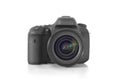 DSLR professional photo camera with a 35 mm lens on plexiglass Royalty Free Stock Photo