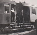 DT00012 HUNGARY, BALATONALMÃÂDI CIRCA 1939 - Lake Balaton - Train on Platform - Railway Station - Nun Leaving the Summer Camp