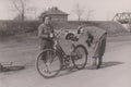 DT00077 HUNGARY CIRCA 1950 Man pumping a bycicle wheel