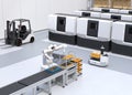 Dual-arm robot assembly motor coils in cell-production space. AGV, forklift and CNC machines at background Royalty Free Stock Photo