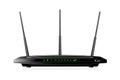 Dual Band Wireless SOHO router with WAN port and 4 LAN ports. The router has 3 antennas. Black colour.