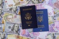 Passports of dual citizens US Passport and Ukrainian passports of US Ukrainian Currency Royalty Free Stock Photo