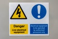 Dual Danger live electrical equipment and electrical equipment to be isolated sign