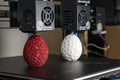 Dual extruder 3d printer which finished printing two bicolor egg model, idex technology