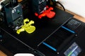 Dual extruder 3d printer which is printing two bicolor model, idex technology