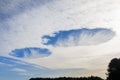Dual hole punch cloud Royalty Free Stock Photo