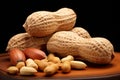 Dual presentation Isolated peanuts displayed in shell and peeled Royalty Free Stock Photo