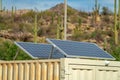 Dual solar or photovoltaic pannel in the desert sunlight in arizona gathering natural energy from the skies