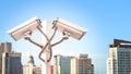 Dual surveillance cctv camera on pole in city tower with flare light effect and copyspace, Use for surveillance camera and