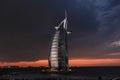 Dubai. Burj Al Arab by night, Luxury 7 Stars Hotel. Overcast night. Royalty Free Stock Photo