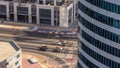 Dubai business bay district with office skyscrapers and traffic on the road intersection aerial timelapse. Royalty Free Stock Photo