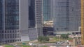 Dubai business bay district with office skyscrapers and traffic on the road intersection aerial timelapse. Royalty Free Stock Photo