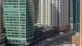 Dubai business bay district with office skyscrapers and traffic on the road intersection aerial timelapse. Royalty Free Stock Photo