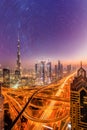 Dubai city at night under a starry sky in United Arab Emirates