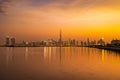 Dubai city skyline at night with a colorful sky and reflection on the water. A view from Al Jaddaf, Dubai. Royalty Free Stock Photo