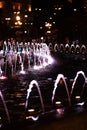 Dubai Dancing Fountain - wonderful evening show. Night fountain illuminated in different colors