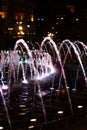 Dubai Dancing Fountain - wonderful evening show. Night fountain illuminated in different colors