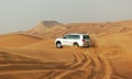 The Dubai desert trip in off-road car Royalty Free Stock Photo