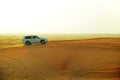 The Dubai desert trip in off-road car Royalty Free Stock Photo