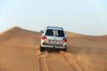 The Dubai desert trip in off-road car Royalty Free Stock Photo