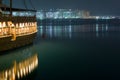 Dubai - Dhow Lights reflection and Palm constructi Royalty Free Stock Photo