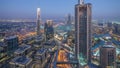 Dubai Downtown day to night timelapse modern towers panoramic view from the top in Dubai, United Arab Emirates. Royalty Free Stock Photo