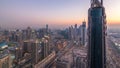 Dubai Downtown day to night timelapse modern towers panoramic view from the top in Dubai, United Arab Emirates. Royalty Free Stock Photo