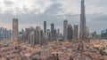 Dubai Downtown day to night transition timelapse with tallest skyscraper and other towers Royalty Free Stock Photo