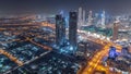 Dubai downtown with large-scale construction of a residential complex with cranes aerial night timelapse Royalty Free Stock Photo