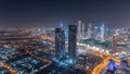 Dubai downtown with large-scale construction of a residential complex with cranes aerial night timelapse Royalty Free Stock Photo