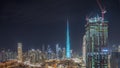 Dubai Downtown night timelapse with tallest skyscraper and other towers Royalty Free Stock Photo