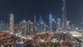 Dubai Downtown night timelapse with tallest skyscraper and other towers Royalty Free Stock Photo