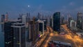 Dubai Downtown night to day timelapse. Aerial view over big futuristic city by night. Royalty Free Stock Photo