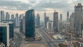 Dubai Downtown night to day timelapse. Aerial view over big futuristic city by night.