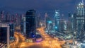 Dubai Downtown night to day timelapse. Aerial view over big futuristic city by night. Royalty Free Stock Photo