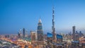 Dubai downtown skyline day to night with tallest building and Sheikh Zayed road traffic, UAE Royalty Free Stock Photo